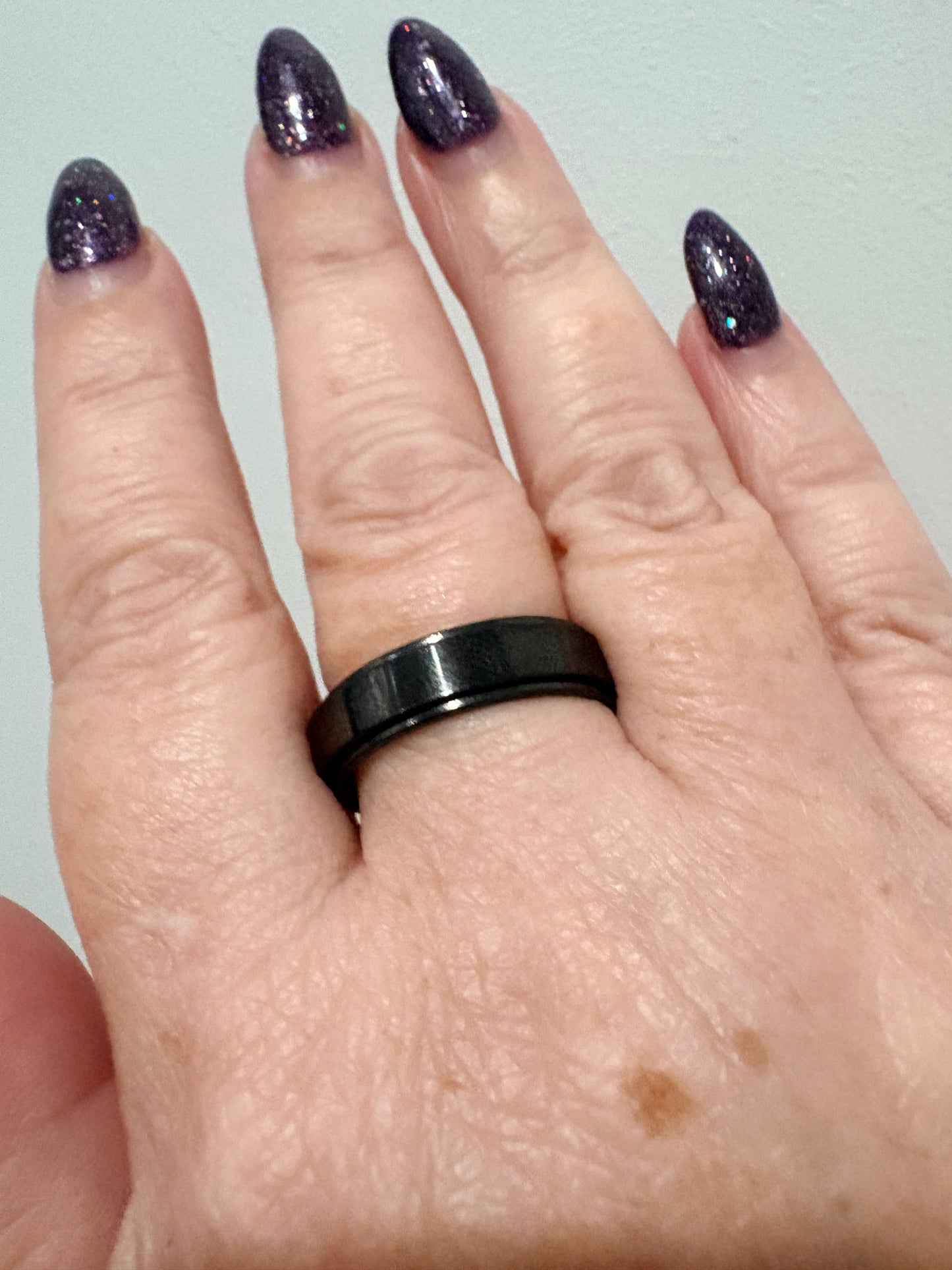 Black Spin Ring